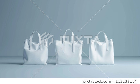 A white purse with a gold strap sits on a table in front of a plant A white purse with a gold strap sits on a table in front of a plant 113133114