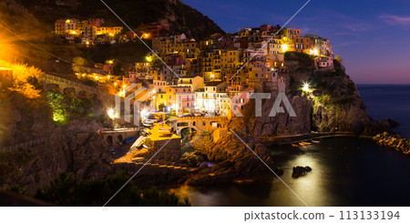 Colorful houses of Manarola, La Spezia in evening from sea view 113133194