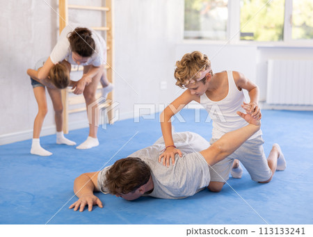 Father and son training self-defense techniques Father and son training self-defense techniques 113133241