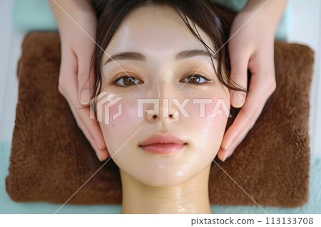 Woman receiving a face massage 2 AI generated image 113133708
