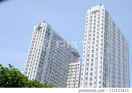 office building against the blue sky 113133815