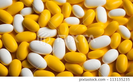 White pills on blue background 113135235