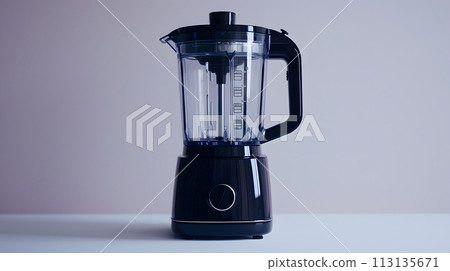A sleek black blender contrasts against the white table A sleek black blender contrasts against the white table 113135671