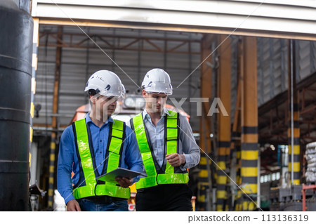 Supervisors architect and engineers wearing safety white helmet railway track design Supervisors architect and engineers wearing safety white helmet railway track design 113136319