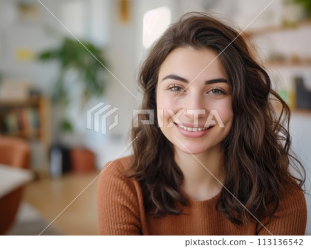 A beautiful, smiling young woman with a confident and pretty face, exuding warmth and happiness A beautiful, smiling young woman with a confident and pretty face, exuding warmth and happiness 113136542