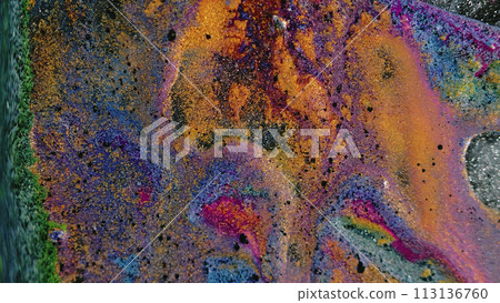 Glitter fluid background. Ink flow. Sparkling mix. Colorful green black purple yellow shimmering paint blend stream motion on silver surface in abstract captivating fantasy art. 113136760