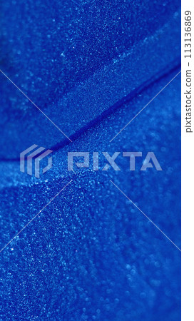Glitter wave. Sparkling texture. Bokeh light. Blur blue color shiny grain crystals fluid ink decorative abstract art free space background. Glitter wave. Sparkling texture. Bokeh light. Blur blue color shiny grain crystals fluid ink decorative abstract art free space background. 113136869