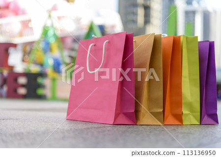 Shopping bags of women crazy shopaholic person at fashion shopping mall indoor. Fashionable Woman love online shopping website with sales tag. E-commerce digital marketing happy city lifestyle person 113136950