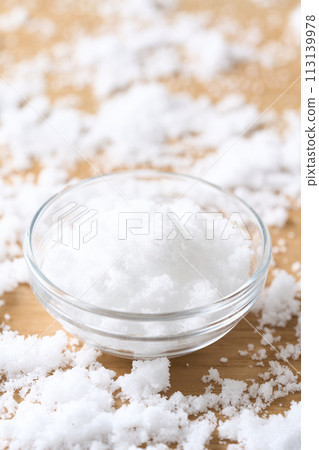 Caster sugar on a glass plate Caster sugar on a glass plate 113139978