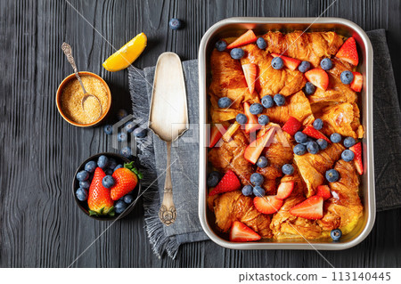 berry croissant casserole in baking dish, top view berry croissant casserole in baking dish, top view 113140445