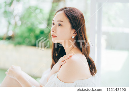 Young woman doing UV care 113142390