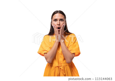 a black-haired slender woman dressed in an orange dress is surprised and opened her mouth a black-haired slender woman dressed in an orange dress is surprised and opened her mouth 113144063