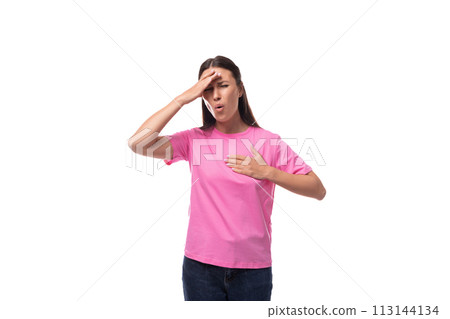 young good-looking woman with black hair dressed in a pink t-shirt actively gesticulates young good-looking woman with black hair dressed in a pink t-shirt actively gesticulates 113144134