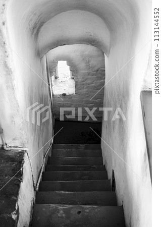Staircase in the tower of medieval belfry of the Spaso-Preobrazhensky Monastery in Yaroslavl Staircase in the tower of medieval belfry of the Spaso-Preobrazhensky Monastery in Yaroslavl 113144552