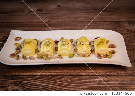 LEBANESE PASTRY RECIPE, ORIENTAL FOOD, HALAWET AL JEBEN, MOZARELLA, ASHTA AND FINE SEMOLINA 113144569