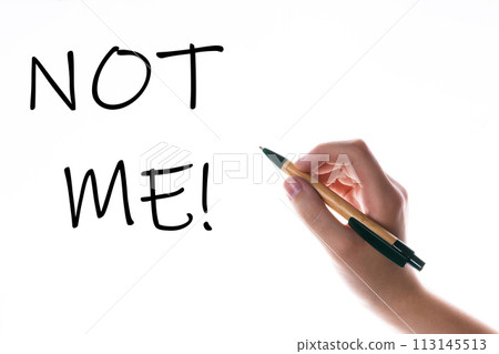 Children hand with pen write on an blue white background. Writing hand. Word Not me Children hand with pen write on an blue white background. Writing hand. Word Not me 113145513