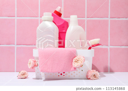 Detergents in a basket on a pink background Detergents in a basket on a pink background 113145868
