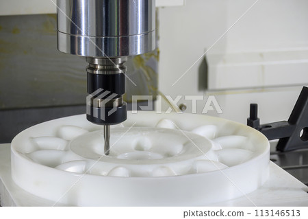 The CNC milling machine cutting the nylon parts with solid ball end mill tool. The CNC milling machine cutting the nylon parts with solid ball end mill tool. 113146513