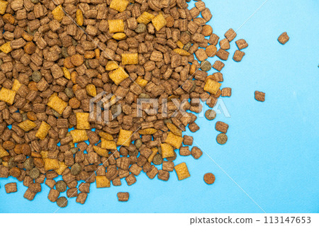 Dry food for kittens and cats close-up. A complete cat diet Dry food for kittens and cats close-up. A complete cat diet 113147653