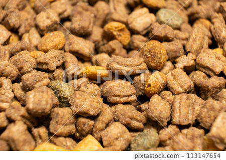 Dry food for kittens and cats close-up. A complete cat diet Dry food for kittens and cats close-up. A complete cat diet 113147654