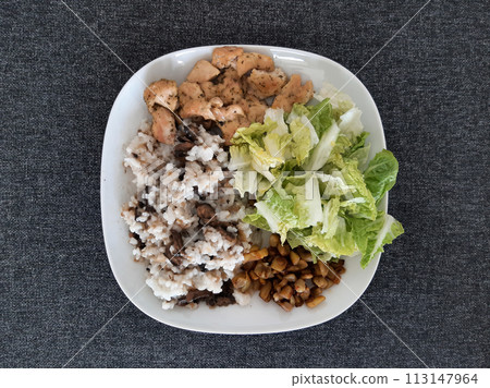 Homemade grilled chicken with grilled chopped eggplant, green salad, and rice Pilaf with mushrooms Homemade grilled chicken with grilled chopped eggplant, green salad, and rice Pilaf with mushrooms 113147964