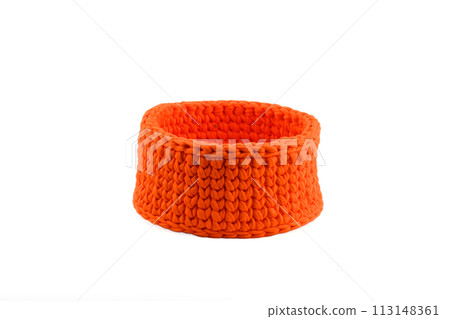 Wicker orange basket on a white background 113148361