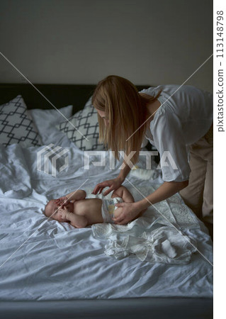 a mother take care of her child a mother take care of her child 113148798