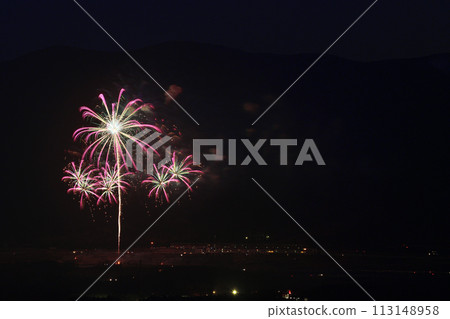Fireworks color the night sky in early summer 113148958