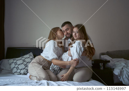 parents play with their daughter parents play with their daughter 113148997