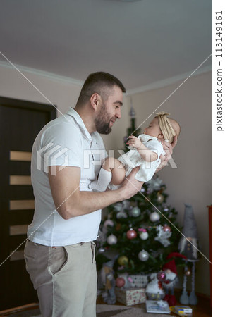 father plays with his daughter 113149161
