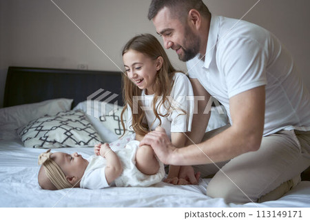 father plays with his daughter 113149171