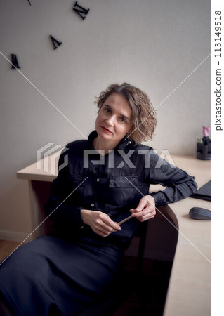 woman with laptop work in office woman with laptop work in office 113149518