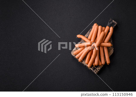 Delicious fresh small vegetarian sausages with salt, spices and herbs 113150946