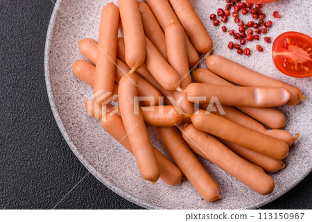 Delicious fresh small vegetarian sausages with salt, spices and herbs Delicious fresh small vegetarian sausages with salt, spices and herbs 113150967