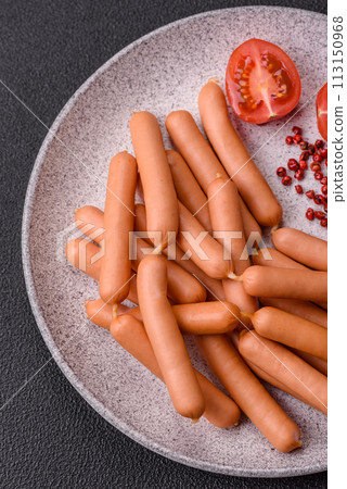 Delicious fresh small vegetarian sausages with salt, spices and herbs Delicious fresh small vegetarian sausages with salt, spices and herbs 113150968