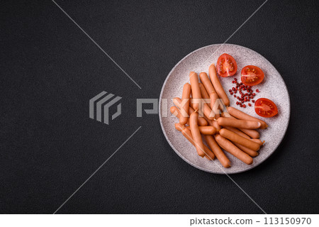 Delicious fresh small vegetarian sausages with salt, spices and herbs Delicious fresh small vegetarian sausages with salt, spices and herbs 113150970