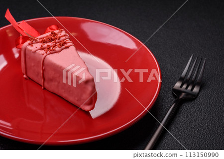 Delicious sweet cheesecake with fruits covered with icing with a wooden stick Delicious sweet cheesecake with fruits covered with icing with a wooden stick 113150990