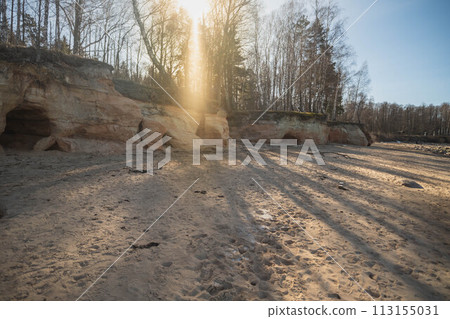 Sunlit Forest Landscape with Eroded Sand Formations. Veczemju cliffs, Latvia Sunlit Forest Landscape with Eroded Sand Formations. Veczemju cliffs, Latvia 113155031