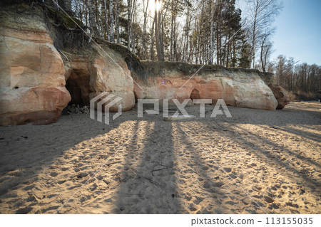 Sunlight Casting Shadows on Eroded Forest Rocks. Veczemju cliffs, Latvia Sunlight Casting Shadows on Eroded Forest Rocks. Veczemju cliffs, Latvia 113155035