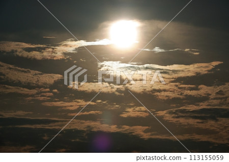 Clouds illuminated by the setting sun, early summer, telephoto, sky only, 230723pm 113155059