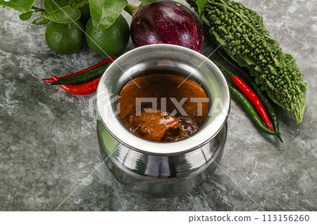 Indian cuisine - chicken curry with spices Indian cuisine - chicken curry with spices 113156260