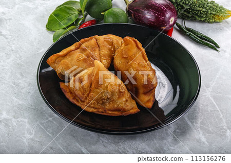 Indian cuisine - fries crispy samosa 113156276