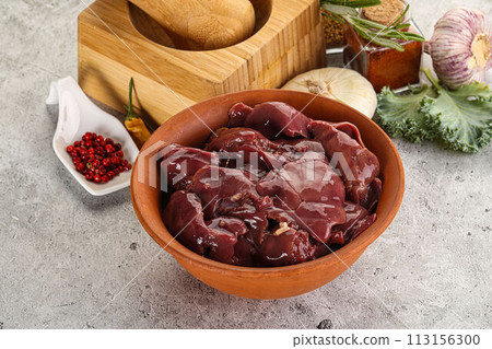 Raw uncooked chicken liver in the bowl 113156300