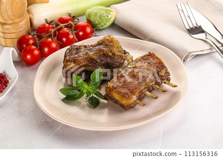 Roasted Lamb ribs with spices 113156316