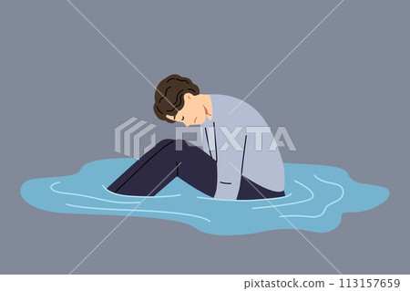 Depressed man sits in puddle of tears, feeling apathy after breaking up with girlfriend 113157659