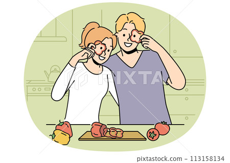 Smiling couple cooking food at kitchen 113158134