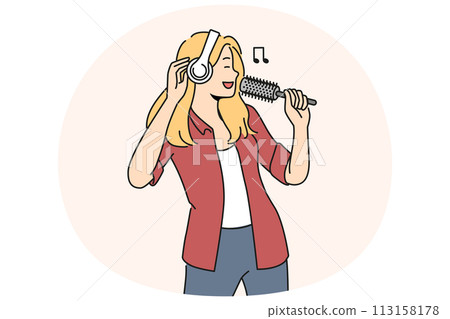 Smiling woman in earphones sing in hairbrush Smiling woman in earphones sing in hairbrush 113158178