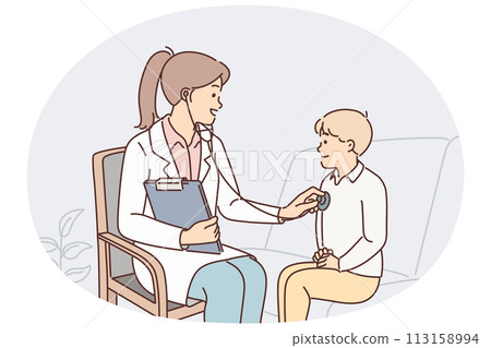 Woman pediatrician uses stethoscope listening to heartbeat of child during pre-school checkup 113158994