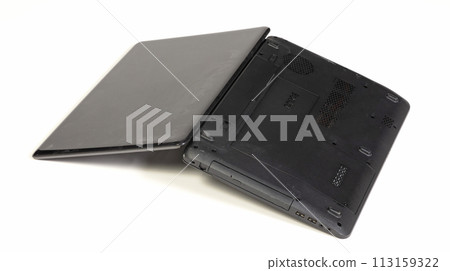 Old broken laptop isolated on white background 113159322