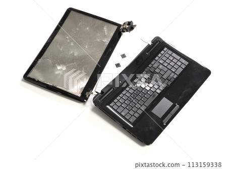 Old broken laptop isolated on white background 113159338